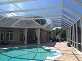 Mansard style pool enclosure by East Coast Aluminum