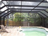 New Smyrna Beach pool enclosure by East Coast Aluminum